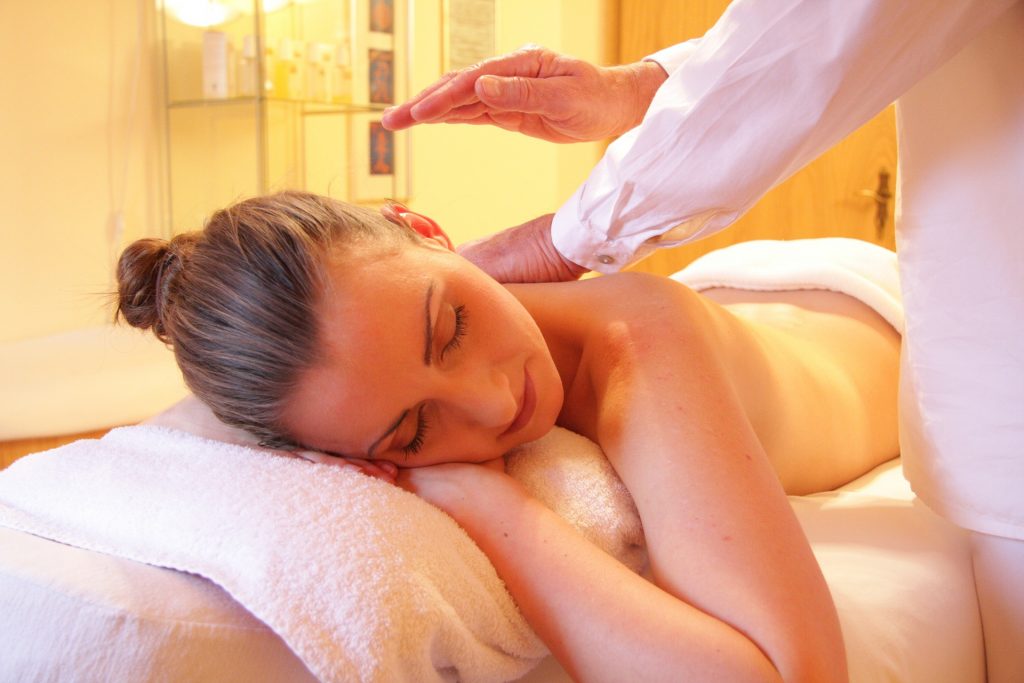 blog picture of lady turned receiving a massage